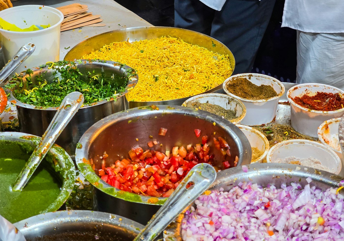 Party catering table with snacks, chaat and sweets